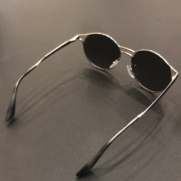 Prada —Sunglasses